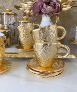 Inspire Me! Home Decor Gold Textured Metal Tea Cup And Saucer With White Interior